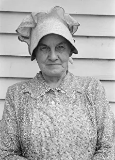 Bonnet Collection: Member of the congregation of Wheeleys church... near Gordonton, North Carolina, 1939