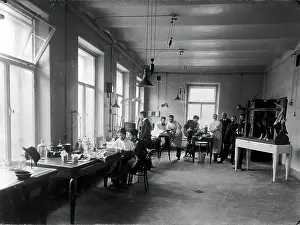 Behaviour Prints: Ten members of staff studying and performing experiments on dogs in the Physiology