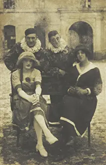 Members of The Stars concert party, two soldiers in drag and two as pierrots, pose around... 1919 Creator: Unknown.<br> Members of The Stars concert party