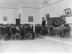 Debating Prints: Men debating in class, Carlisle Indian School