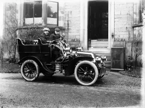 Front Door Prints: Two men in a De Dion Bouton car, c1904