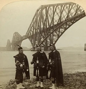 William Arrol Prints: Men in Highland dress in front of the Forth Bridge