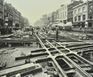 Roadworks Prints: Men laying tramlines at a junction, Whitechapel High Street, London, 1929