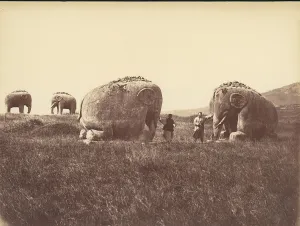 Elephant Prints: Two Men by Monumental Elephant Statues, China, 1860s-70s. Creator: Unknown