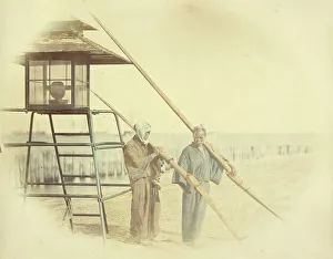 Bakumatsu Prints: Two Men with Oars Standing Next to a Lantern, 1866-1867. Creator: Felice Beato