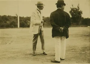 Peace Conference Prints: Two men, probably journalists, standing on a field, 1905. Creator: Unknown