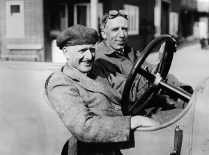 Goggles Prints: Two men in a vintage car