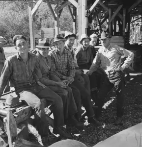 Resting Collection: Men working in mill, Ola self-help sawmill co-op, Gem County, Idaho, 1939. Creator: Dorothea Lange