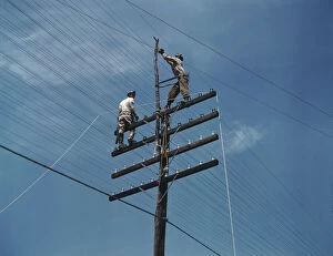 Transparencies Color Gmgpc Gallery: Men working on telephone lines, probably near a TVA dam hydroelectric plant, 1942