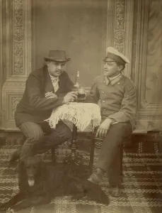 Toasting Prints: Merchant Belogolovy Ivan Apollonovich with his brother, 1910-1919. Creator: Unknown