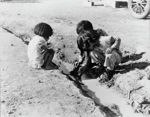 Immigration Prints: Mexican children playing in ditch
