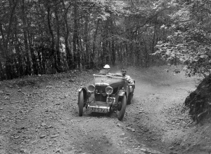 MG J2 competing in the Brighton & Hove Motor Club Brighton-Beer Trial, 1934. Artist