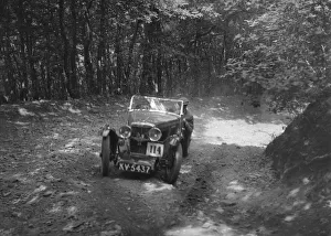MG J2 competing in the Brighton & Hove Motor Club Brighton-Beer Trial, 1934. Artist