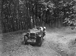 MG J2 competing in the Brighton & Hove Motor Club Brighton-Beer Trial, 1934. Artist