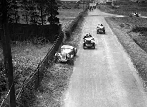 Two MG M types passing a broken down 1928 Alta Prototype, JCC Members Day, Brooklands, 4 July 1931