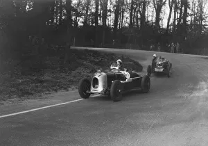 Castle Donington Gallery: MG Magnette of a Rigby leading JR Grices Riley Brooklands at Donington Park, Leicestershire