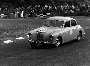 Cornering Prints: MG Magnette ZB, Foster, 1958 Brands Hatch. Creator: Unknown
