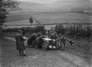 MG PB of K Scales getting a push during the MG Car Club Midland Centre Trial, 1938