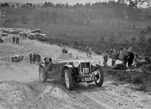 Number Prints: MG TA competing in the Great Weat Motor Club Trial, 1938. Artist: Bill Brunell