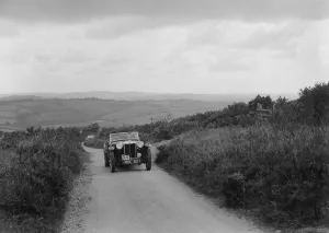 MG TA of RA MacDermid competing in the MCC Torquay Rally, 1938. Artist: Bill Brunell