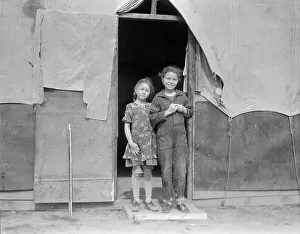 Displacement Prints: Migrant family in Kern County, California, 1936. Creator: Dorothea Lange