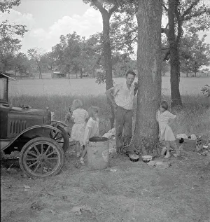 Tuberculosis Prints: Migrant family from Oklahoma in Texas, alongside the road, 1936. Creator: Dorothea Lange