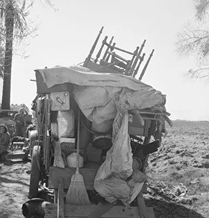 Migrant family outfit on U. S. 99 between Bakersfield, California, and the Ridge, 1939. Creator: Dorothea Lange
