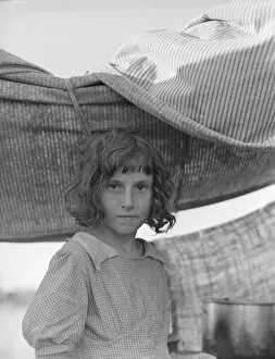 Pots Gallery: Migratory child in camp at end of day, Bean pickers camp near West Stayton, Oregon, 1939