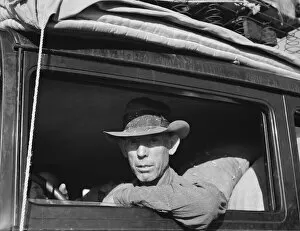 Travelling Gallery: Migratory cotton picker on highway near Merced, California, 1939. Creator: Dorothea Lange