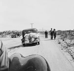 Displaced Persons Collection: Migratory family arriving at growers camp for pickers, Imperial Valley, California, 1939