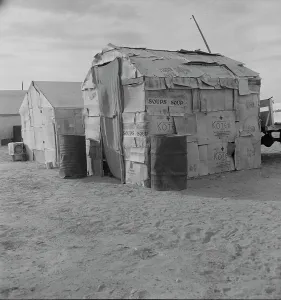 Recycling Prints: Migratory field worker's home on the edge of a pea field