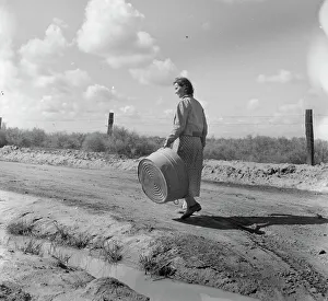 Housework Prints: In a migratory labor camp, California, 1936. Creator: Dorothea Lange