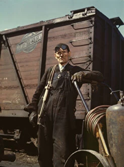 Chicago And North Western Railway Gallery: Mike Evans, a welder, at the rip tracks at Proviso yard of the C & NW RR, Chicago, Ill. 1943