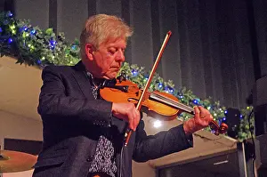 Mike Piggott, East Grinstead Jazz Club, Apron Cafe, Chequer Mead Theatre, West Sussex, April 2025. Creator: Brian O'Connor. Mike Piggott, East Grinstead Jazz Club, Apron Cafe, Chequer Mead Theatre, West Sussex, April 2025