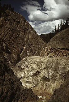 Mountain Range Collection: Million dollar highway [U. S. 550] is cut through massive rocks in Ouray County, Colorado, 1940