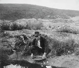 Alaskan Prints: Miner panning gold, 1916. Creator: Unknown