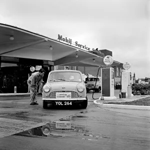 Mini on the 1959 Mobil Economy Run, re- fuelling. Creator: Unknown Mini on the 1959 Mobil Economy Run, re- fuelling. Creator: Unknown
