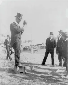 Podium Prints: Minnesota State Fair: African American on soap box using hand puppet