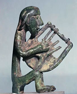 Minoan Gallery: Minoan bronze of a harpist