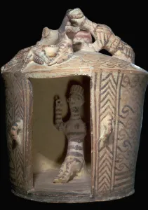 Minoan pottery shrine containing a goddess