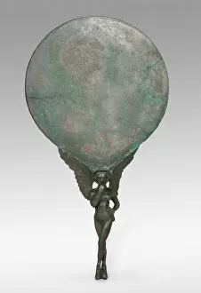 Arts Of The Ancient Mediterranean Collection: Mirror with a Handle in the Form of a Female Figure, 3rd century BCE. Creator: Unknown