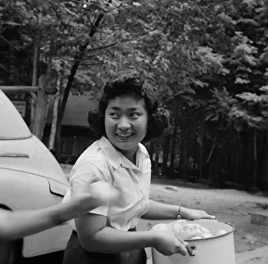 Miss Sumi Yumaguchi, Japanese dietican, Camp Ellen Marvin, Arden, New York, 1943. Creator: Gordon Parks