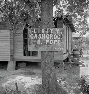Mississippi United States Of America Prints: Mississippi grocery store, 1937. Creator: Dorothea Lange