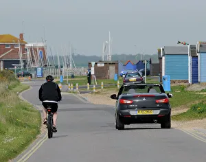 Cyclist Prints: Mitsubishi Colt CZC cabriolet overtaking cyclist