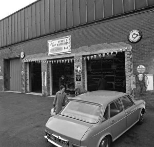 Motor Maintenance Gallery: Mk 1 BMC Austin 1800 outside a tyre fitting bay in Rotherham, South Yorkshire, 1969
