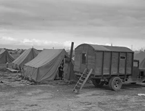 Chimneys Collection: In mobile camp at end of season, cold day, FSA camp, Merrill, Klamath County, Oregon, 1939