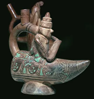 Mochica stirrup-spout vessel of a fisherman Mochica stirrup-spout vessel of a fisherman