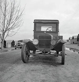Ford Car Prints: Model T Fords still carry migrants
