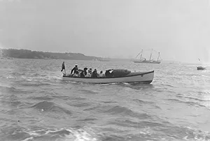 Barque Prints: Modwenas motor launch with Modwena in the background, 1911. Creator: Kirk & Sons of Cowes