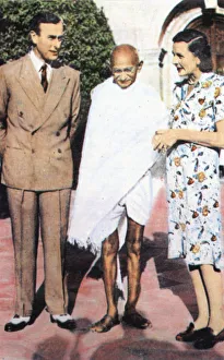 Mohondas Karamchand Gandhi (1869-1948), standing between Lord and Lady Mountbatten